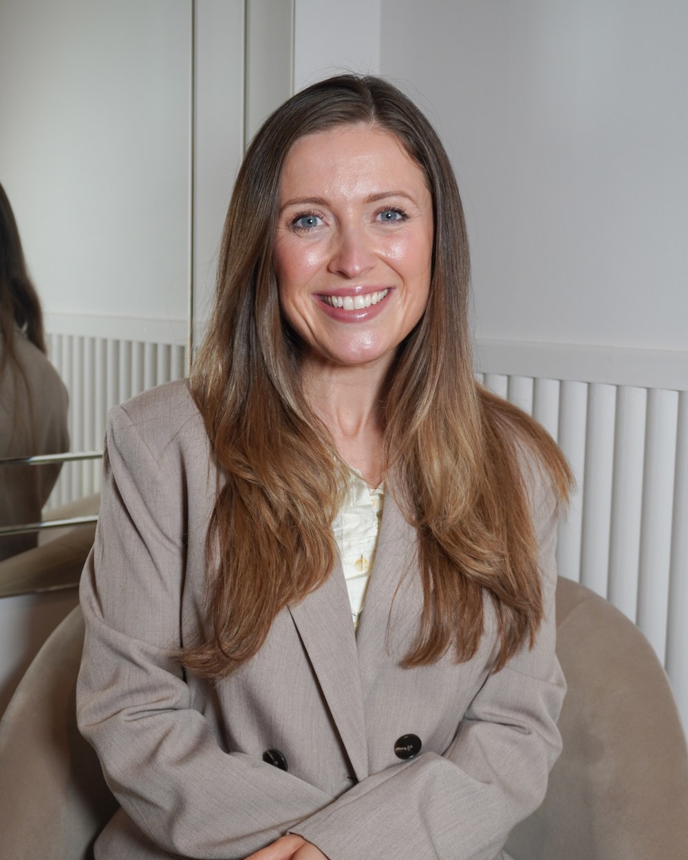 Nurse Kelsey Glynn looking at the camera, registered nurse prescriber